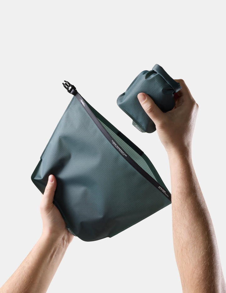 Matador FlatPak Waterproof Toiletry Case (V2) in Juniper - blue-green toiletry bag and soap bar case against a light background