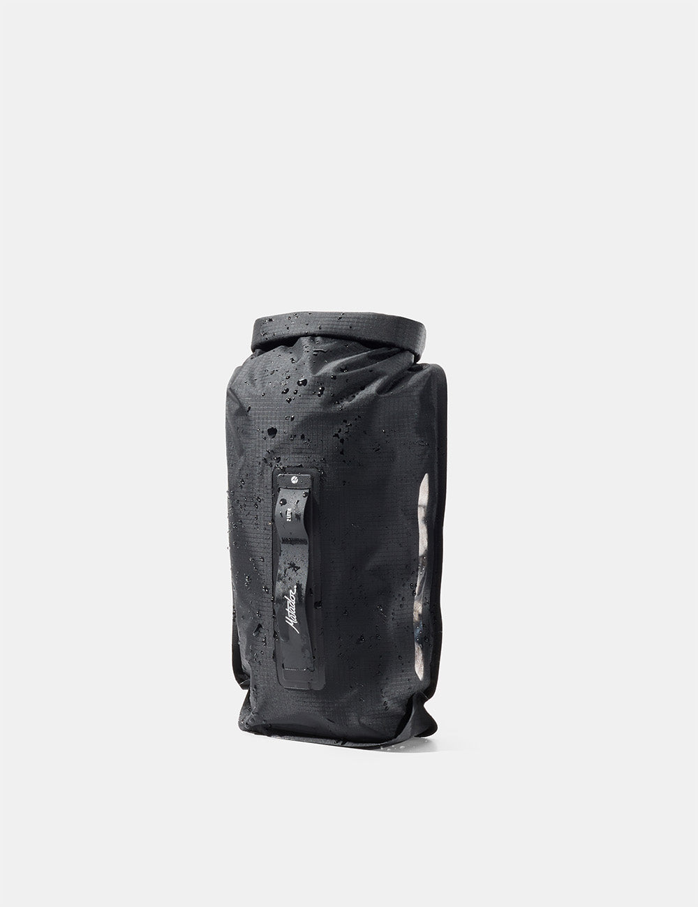 Matador FlatPak Drybag 2L (V2) in Black - black waterproof bag with water droplets on a white background