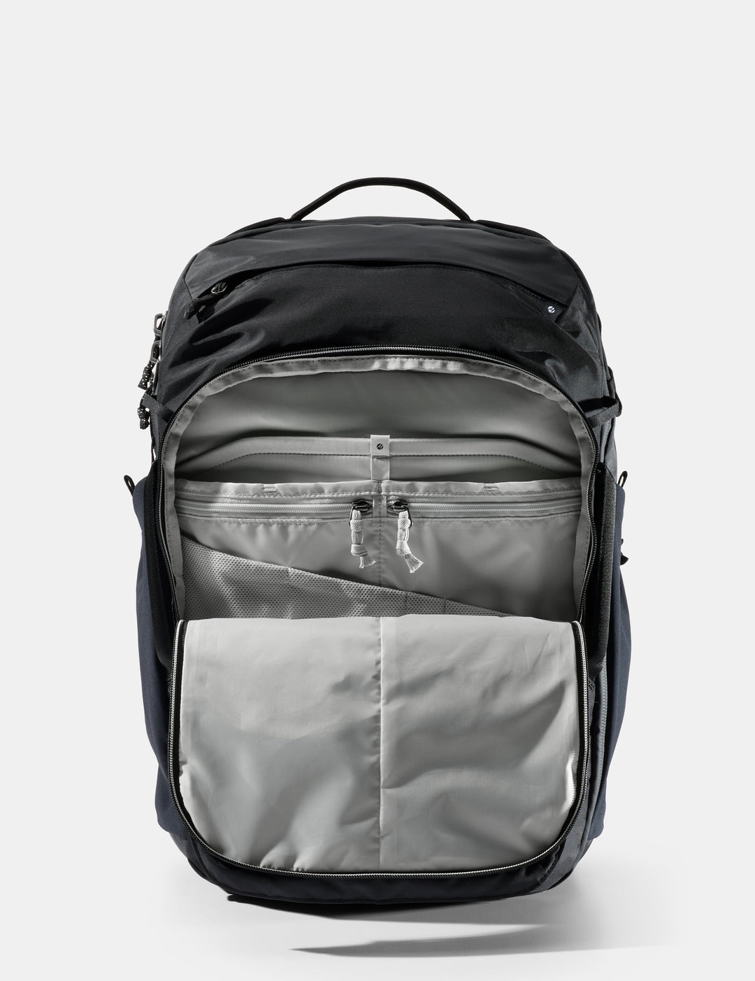 Matador 35L Global Travel Pack in Black - black and gray backpack on a light gray background