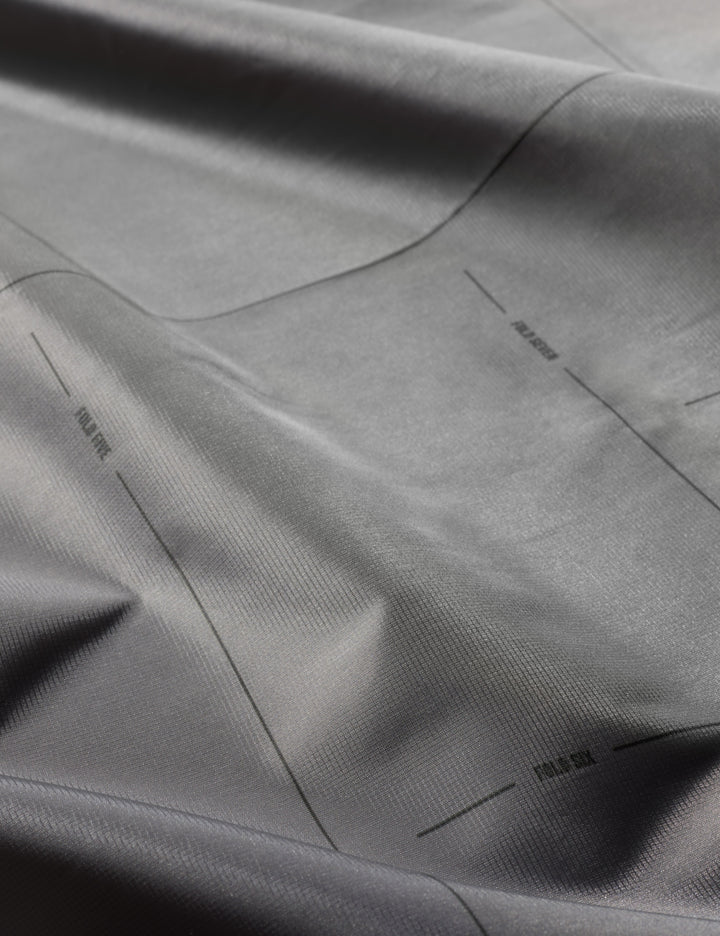 Matador Pocket Blanket™ 4.0 - 160 x 110cm in Blue - close-up of gray fabric with subtle texture