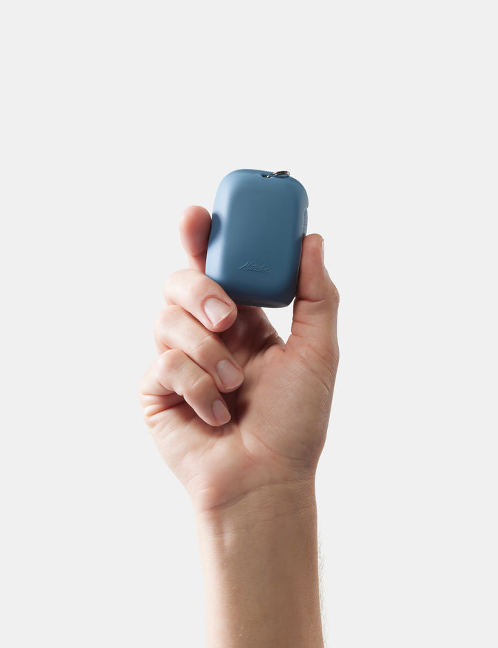 Matador NanoDry Towel - Small 39 x 39cm in Blue - hand holding slate nanodry case against a white background