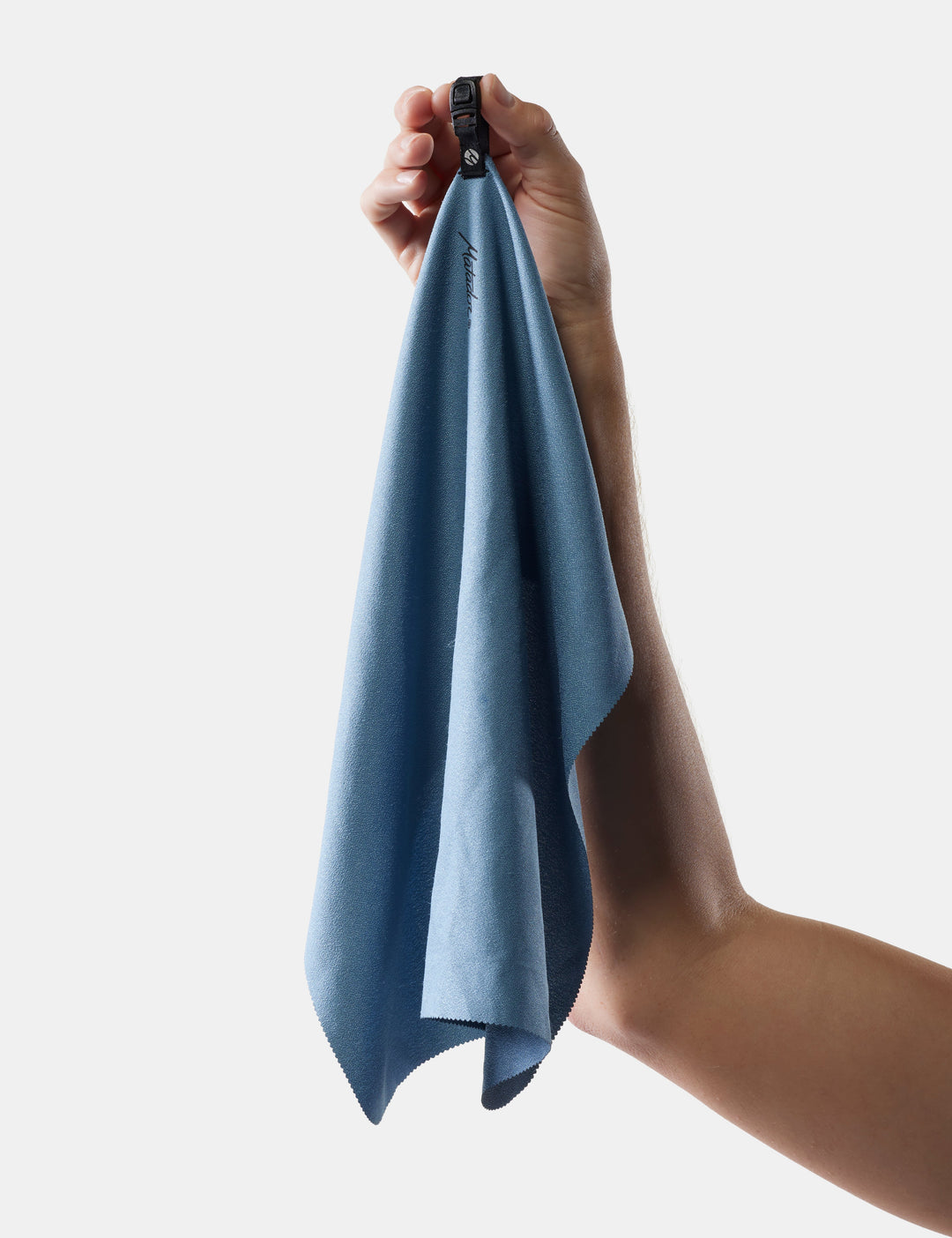 Matador NanoDry Towel - Small 39 x 39cm in Blue - hand holding a slate towel against a light gray background