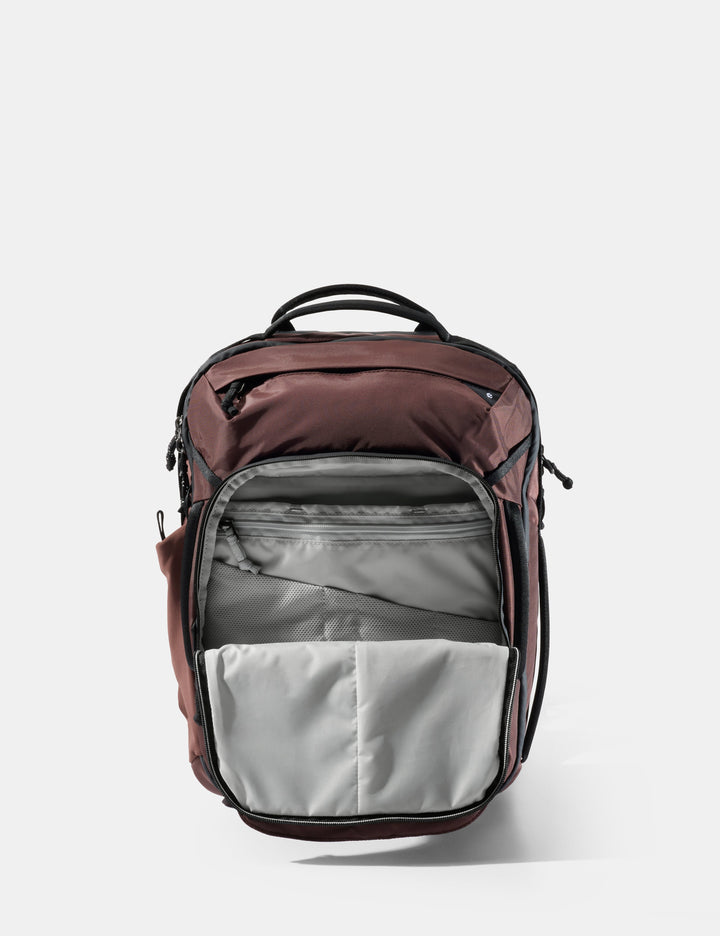 Matador 18L Personal Item Travel Pack in Garnet - backpack with garnet top section and gray bottom section on a white background