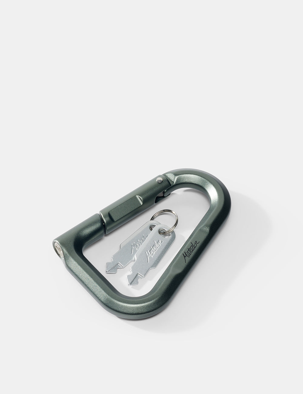 Matador BetaLock in Shadow Green - green carabiner with keys on a white background