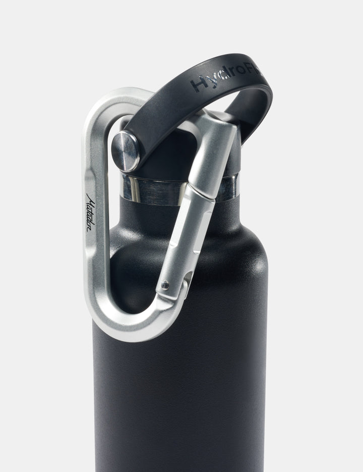 Matador BetaLock in Canyon Orange - black water bottle with silver carabiner on a white background
