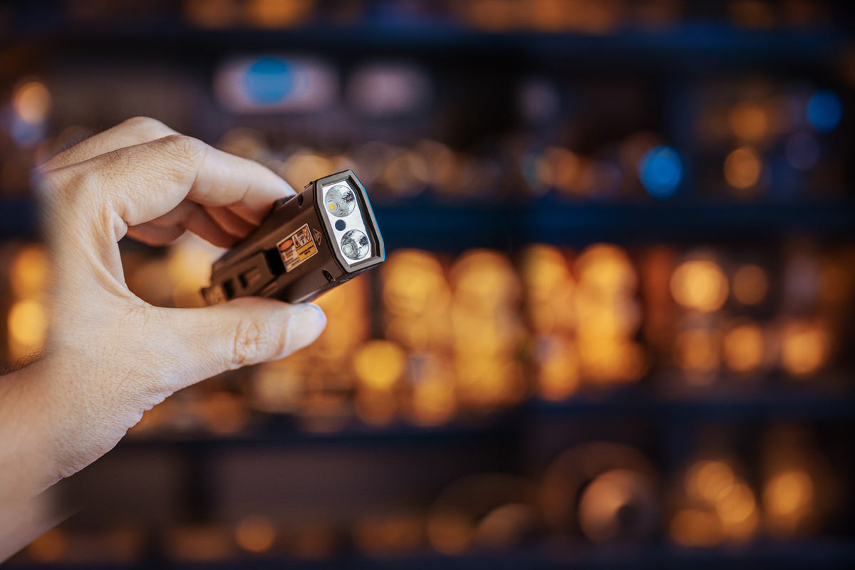 EDC17 flashlight held in hand, wide homepage hero